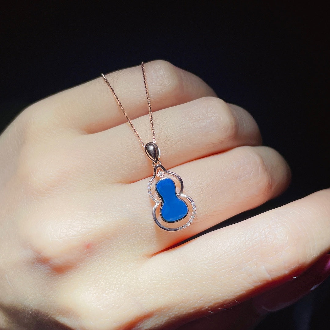 Exquis pendentif en ambre bleu dominicain incrusté d'or 18 carats - Bijoux