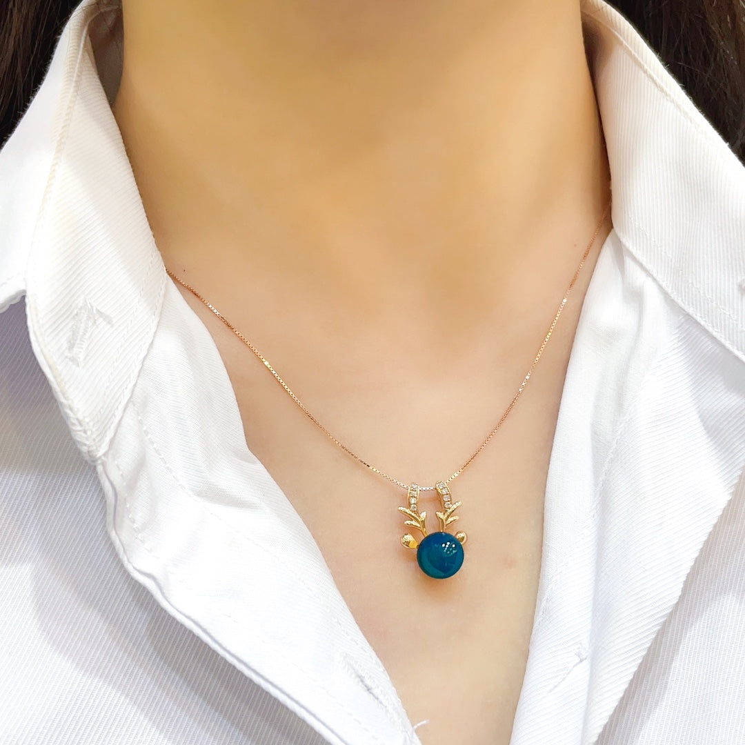 Pendentif en ambre bleu dominicain intégré en or 18 carats - Bijoux exquis