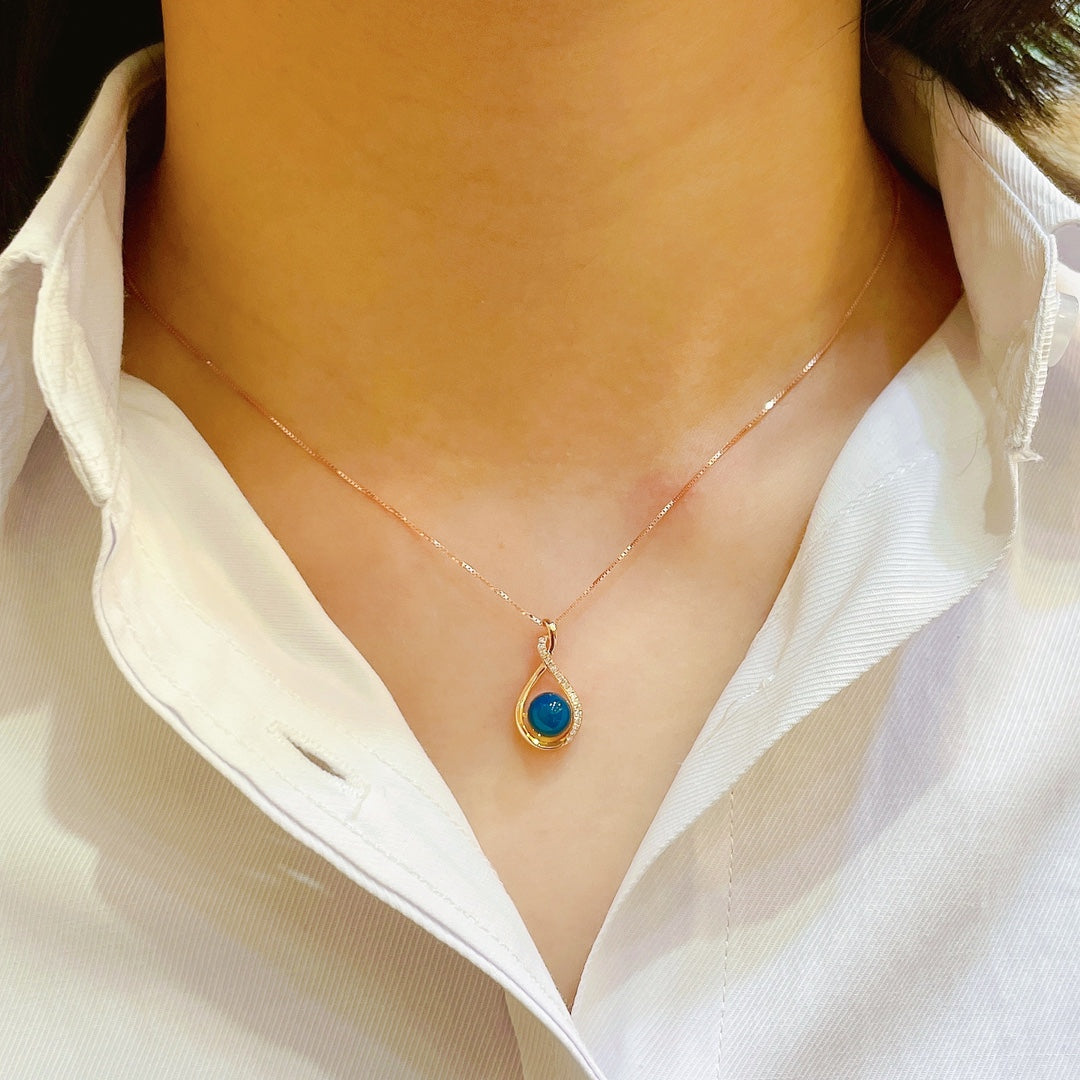 Pendentif en ambre bleu dominicain intégré en or 18 carats - Bijoux exquis