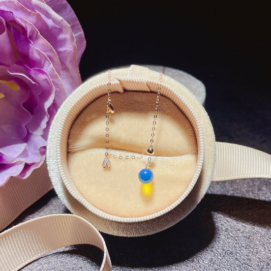 Exquis pendentif en ambre bleu dominicain incrusté d'or 18 carats - Des bijoux pour chaque moment précieux