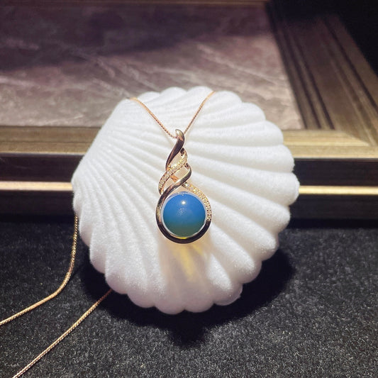 Pendentif en ambre bleu dominicain intégré en or 18 carats - Bijoux exquis