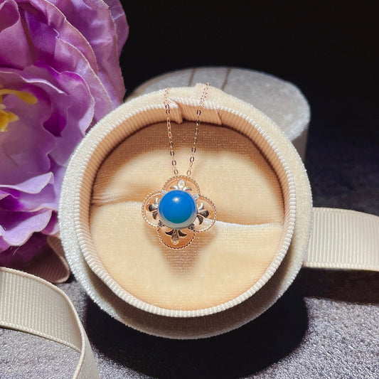 Exquis pendentif en ambre bleu dominicain incrusté d'or 18 carats - Bijoux pour l'élégance