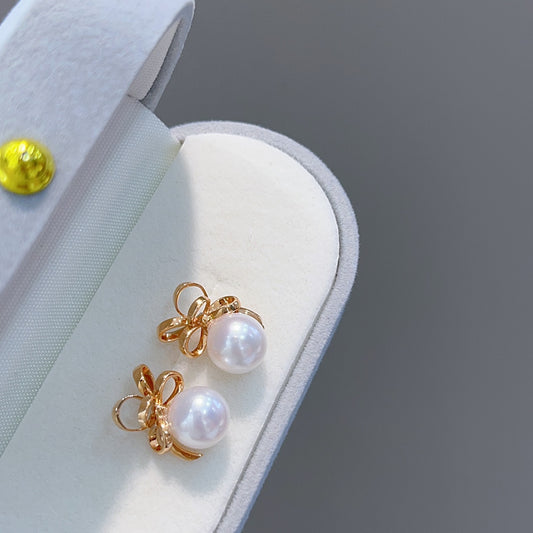 8-8,5 mm Japanse Akoya pareloorbellen in 18K roségoud met zijden strikontwerp - sieraden
