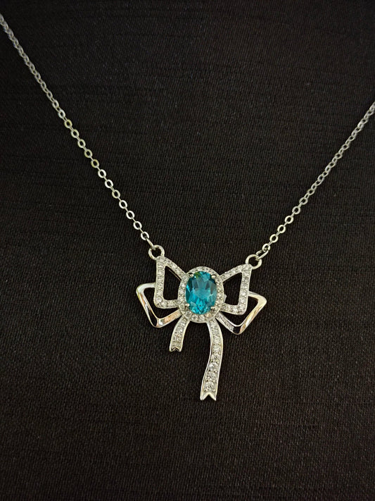 Collier avec nœud papillon en topaze naturelle éblouissante - Un délice de bijoux
