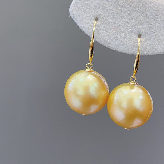 Luxe 15,6 mm Zuidzee gouden pareloorbellen in 18K goud - een must-have voor sieraden
