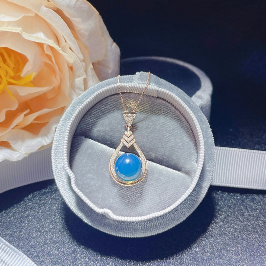 Nouveauté exclusive : bijoux pendentif en ambre bleu dominicain incrustés d'or 18 carats