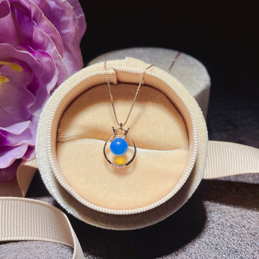 Exquis pendentif en ambre bleu dominicain incrusté d'or 18 carats - Bijoux