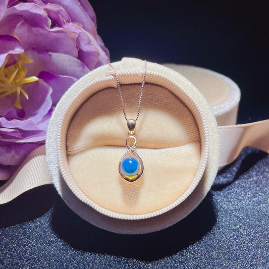 Pendentif en ambre bleu dominicain intégré en or 18 carats - Bijoux exquis