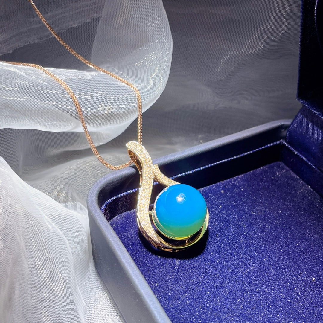 उत्तम 18K गोल्ड एंबेडेड डोमिनिकन ब्लू एम्बर पेंडेंट - मिलने के लिए गर्मी, पुनर्मिलन के लिए शरद ऋतु के आभूषण