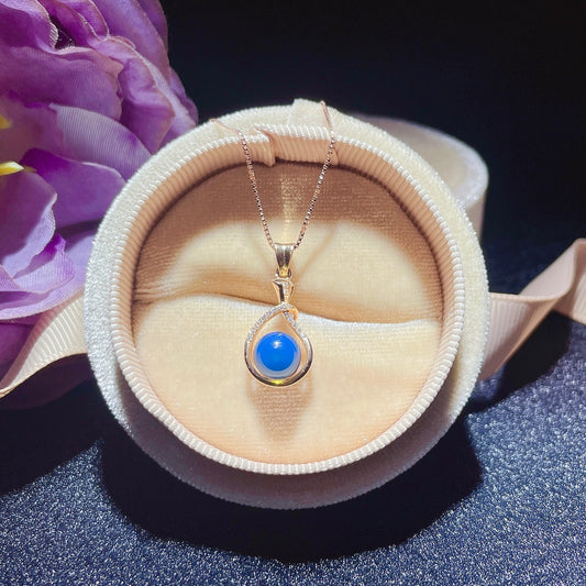 Exquis pendentif en ambre bleu dominicain incrusté d'or 18 carats - Bijoux