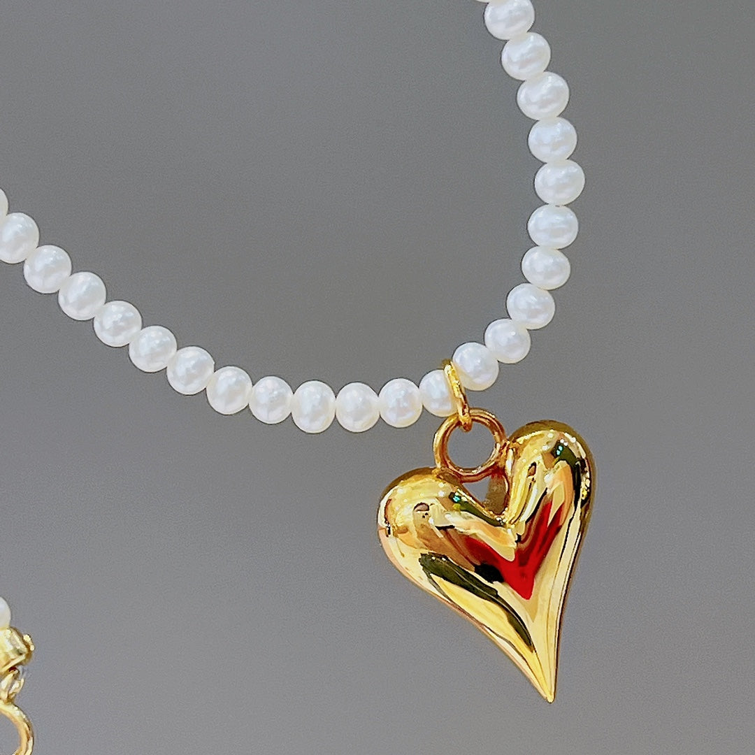Bijoux en or 18 carats et perles d'eau douce naturelles