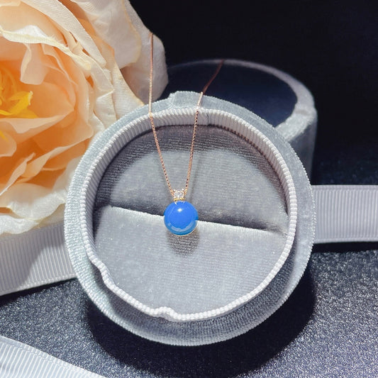 Nouveauté exclusive : Pendentif en ambre bleu dominicain incrusté d'or 18 carats - Bijoux de luxe