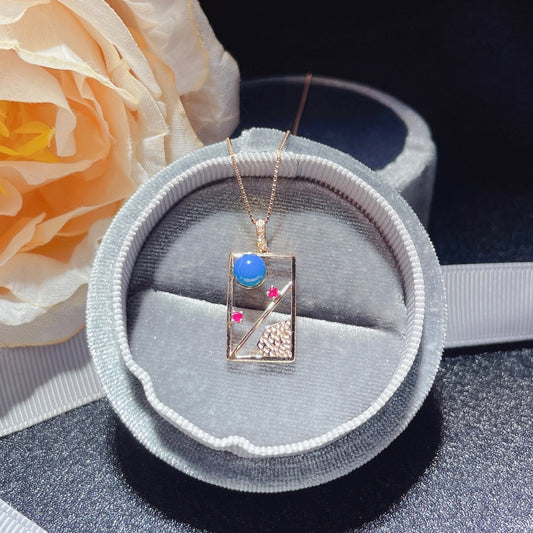 Exquis pendentif en ambre bleu dominicain incrusté d'or 18 carats - Bijoux pour rêves
