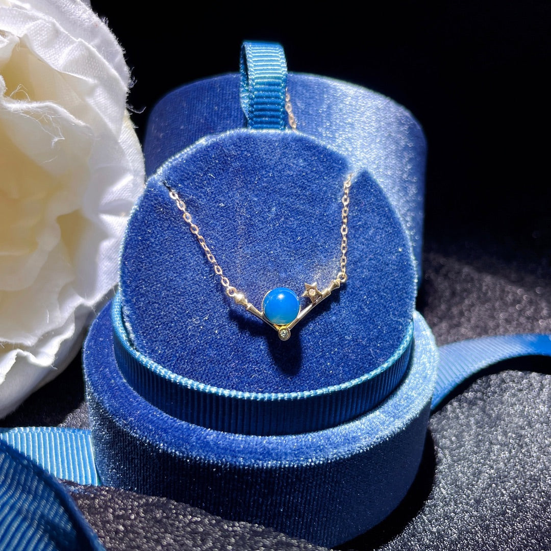 Exquisito Colgante de Ámbar Azul Dominicana Incrustado en Oro de 18K - Joyería Única
