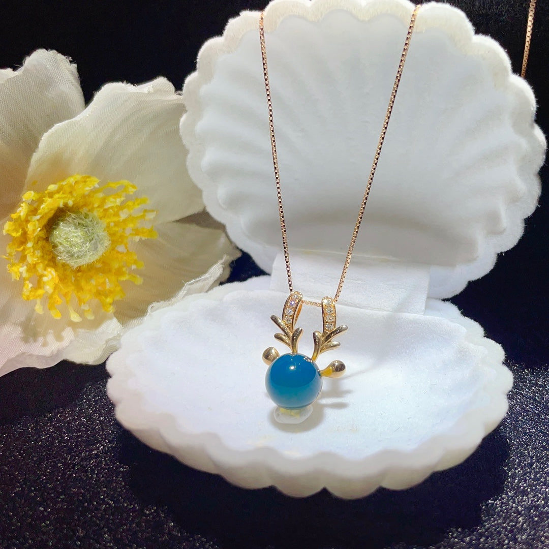 Pendentif en ambre bleu dominicain intégré en or 18 carats - Bijoux exquis