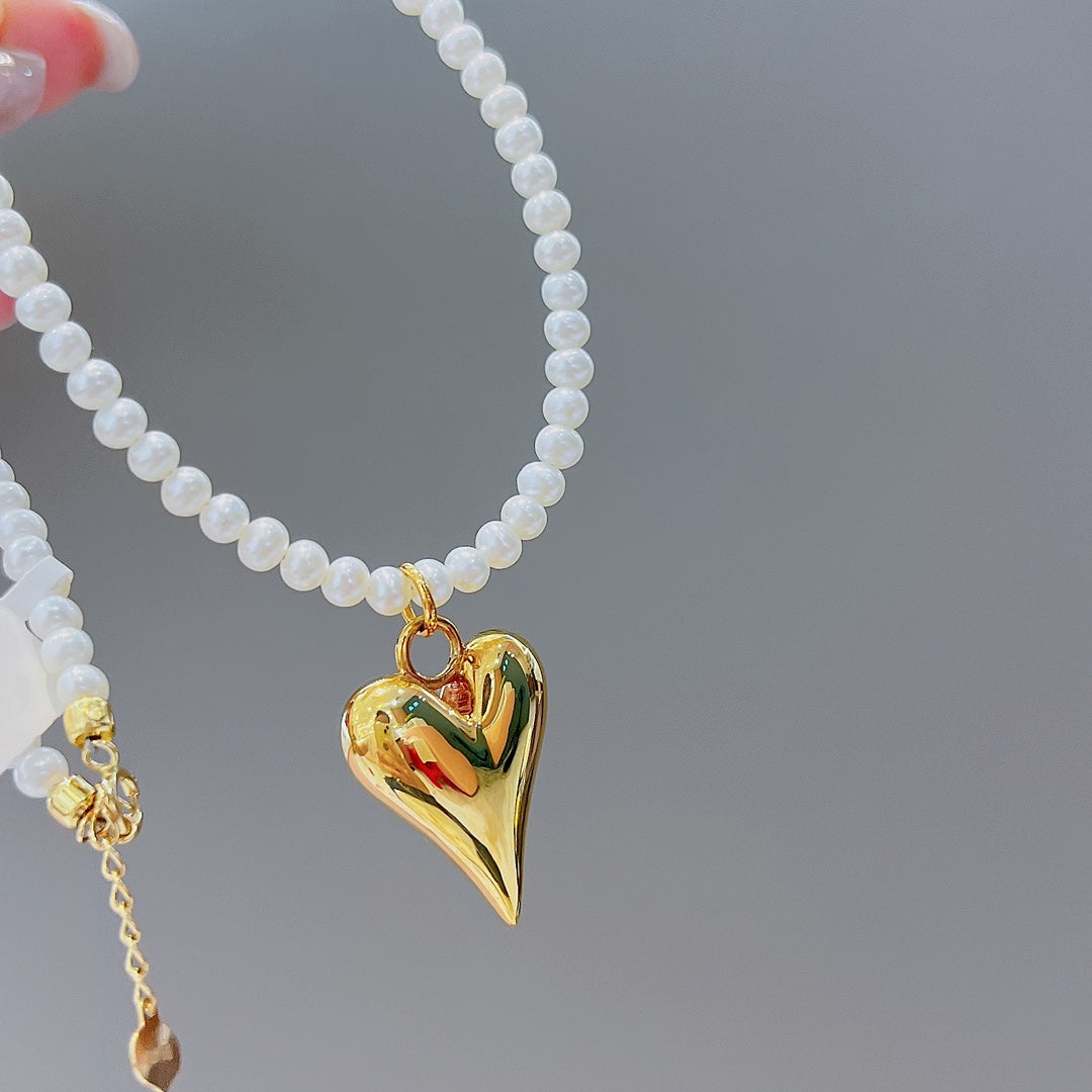Bijoux en or 18 carats et perles d'eau douce naturelles