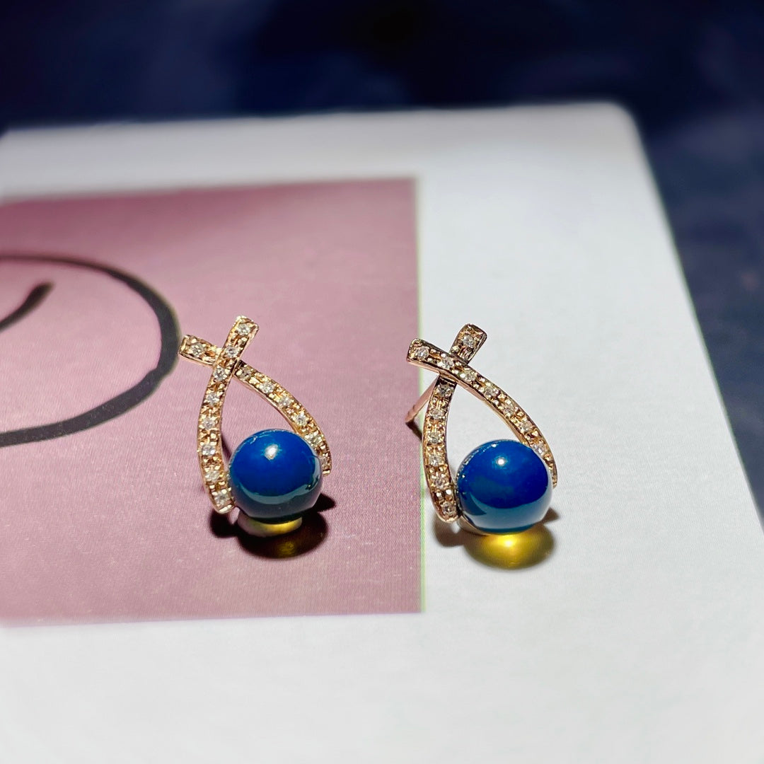 Elegant and Unforced Fashion: 18K Gold Embedded Dominican Blue Amber Earrings