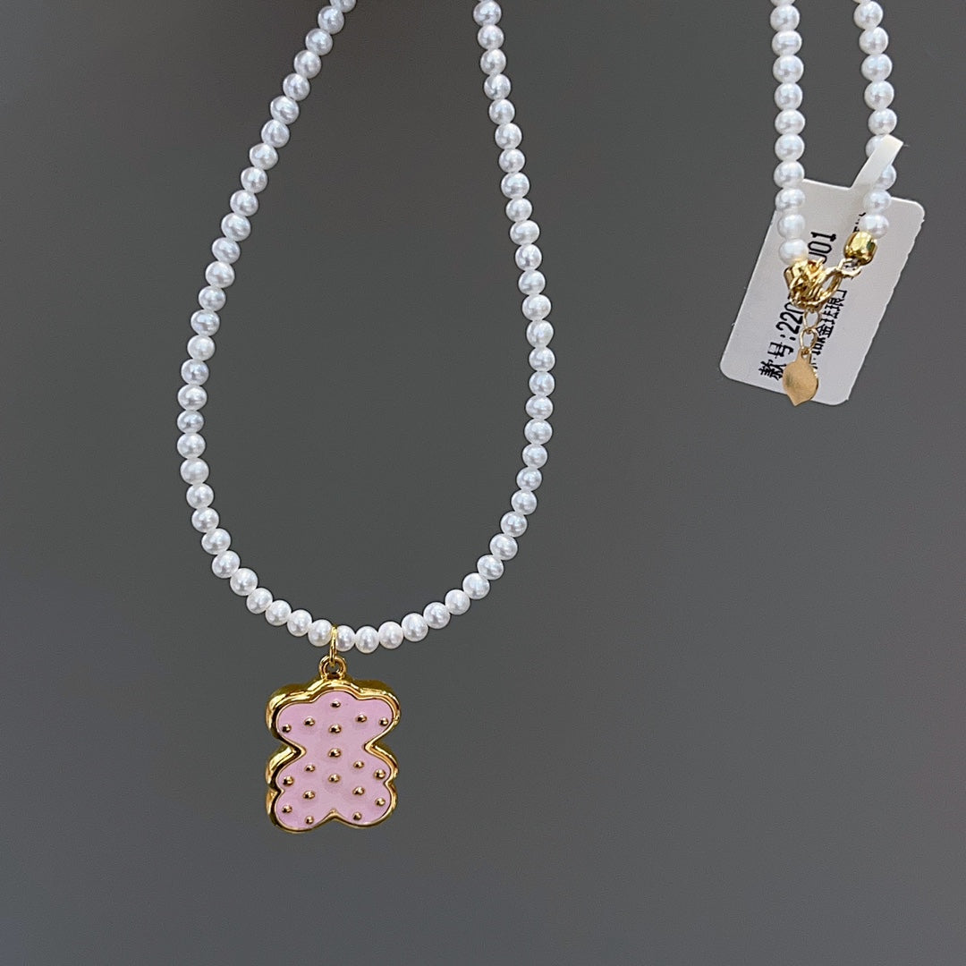 Bedårande rosa björnhängsmycken