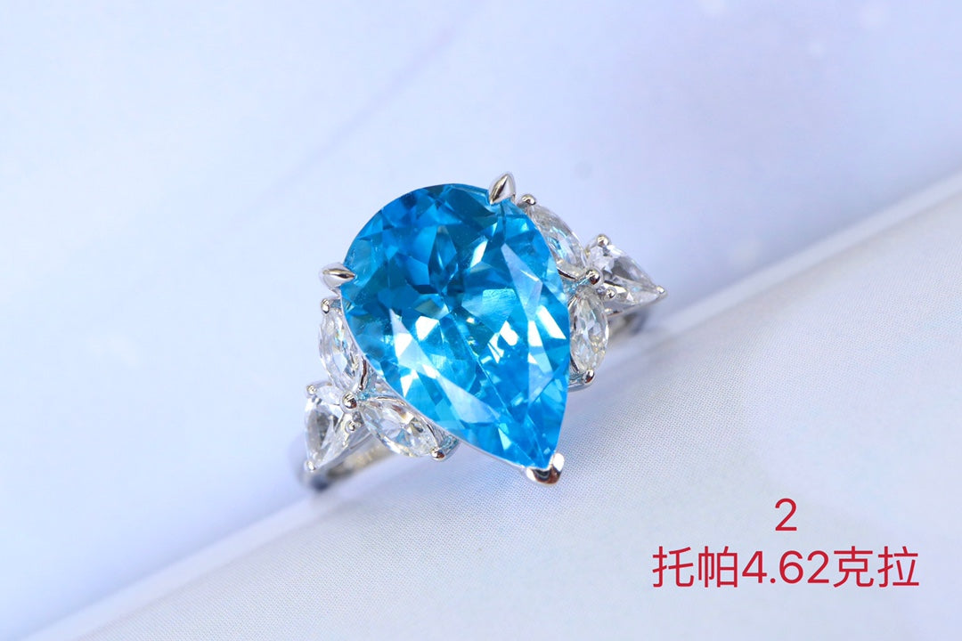 Swiss Blue Topaz Ring with 18K Gold and Diamonds - Elegant Jewelry
