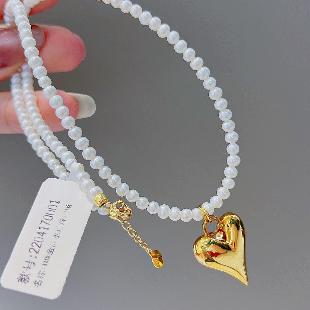 Bijoux en or 18 carats et perles d'eau douce naturelles