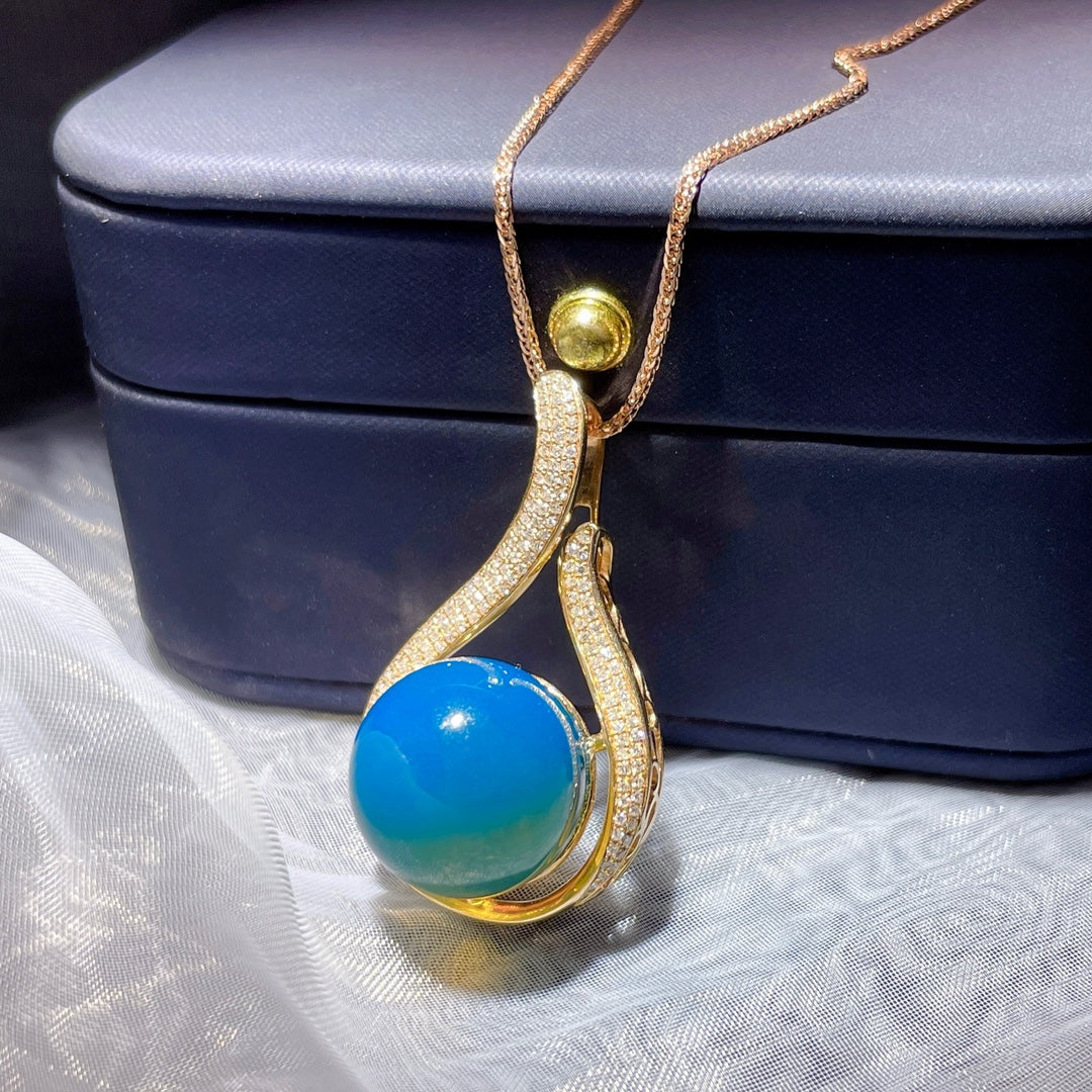 उत्तम 18K गोल्ड एंबेडेड डोमिनिकन ब्लू एम्बर पेंडेंट - मिलने के लिए गर्मी, पुनर्मिलन के लिए शरद ऋतु के आभूषण