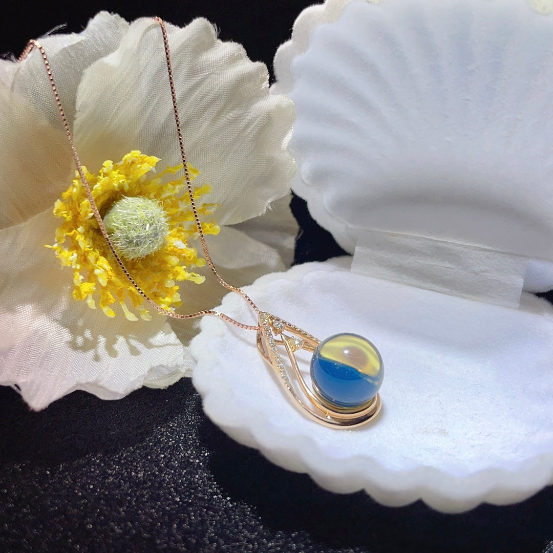 उत्तम 18K गोल्ड एंबेडेड डोमिनिकन ब्लू एम्बर पेंडेंट - आभूषण