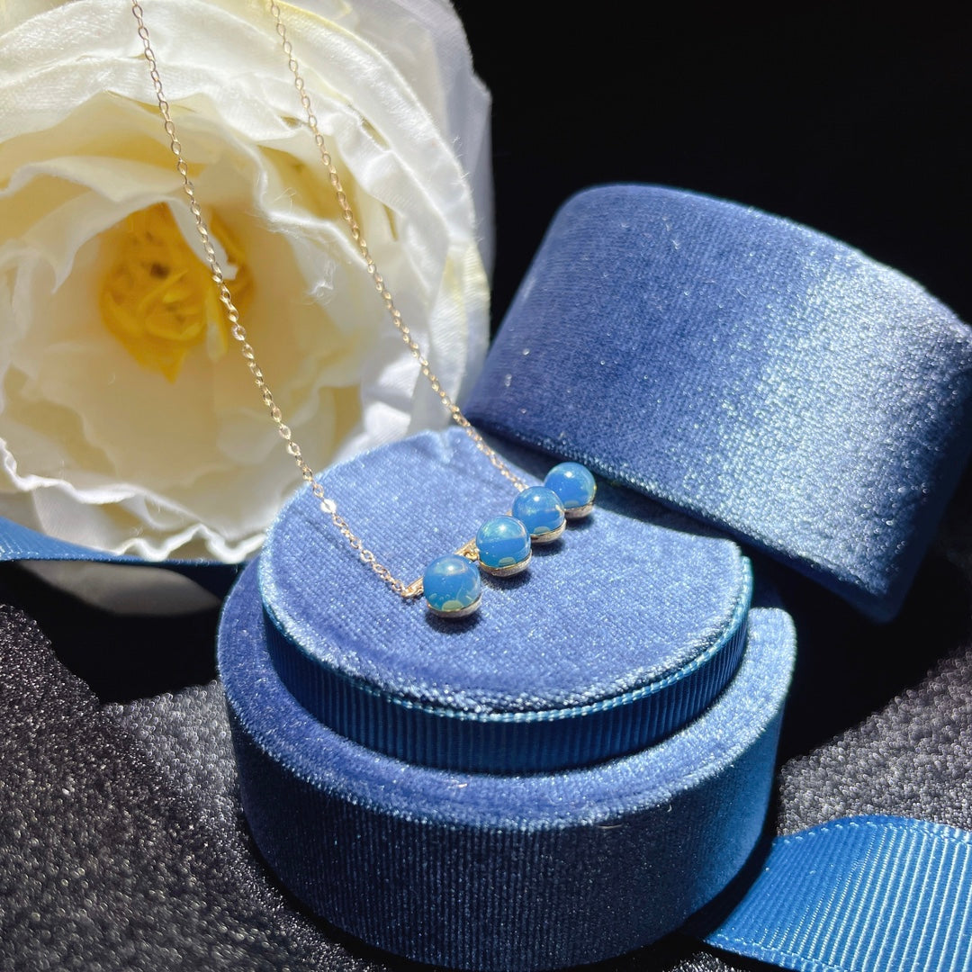 Colgante de Ámbar Azul Dominicana Incrustado en Oro de 18k - Joyería Exquisita