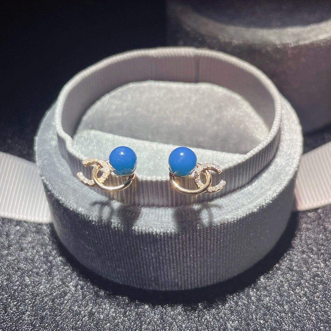 Exquisite 18K Gold Embedded Dominican Blue Amber Earrings - Unique Jewelry