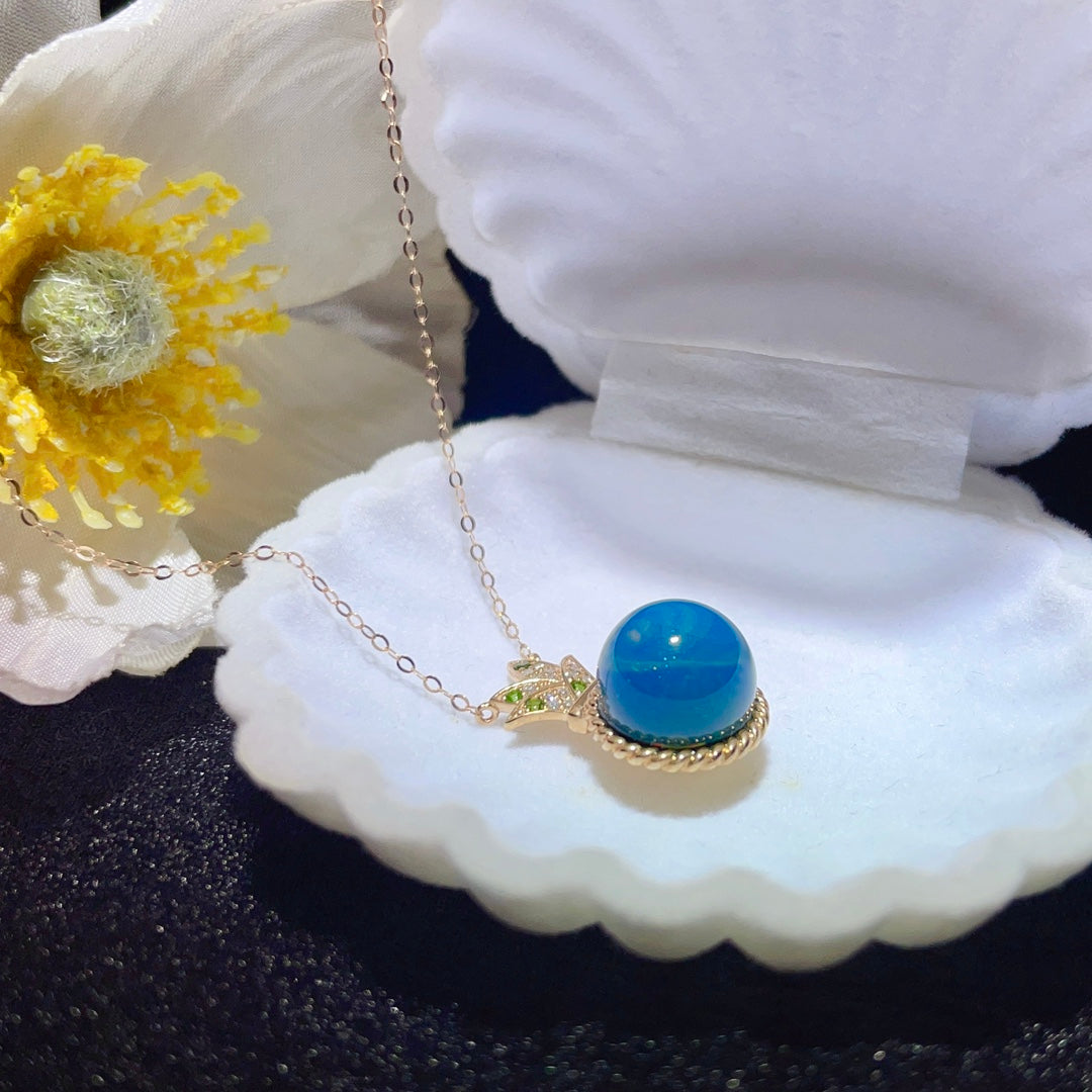 Utsökt 18K guld inbäddat dominikanskt blått bärnstenshänge - smycken för alla tillfällen