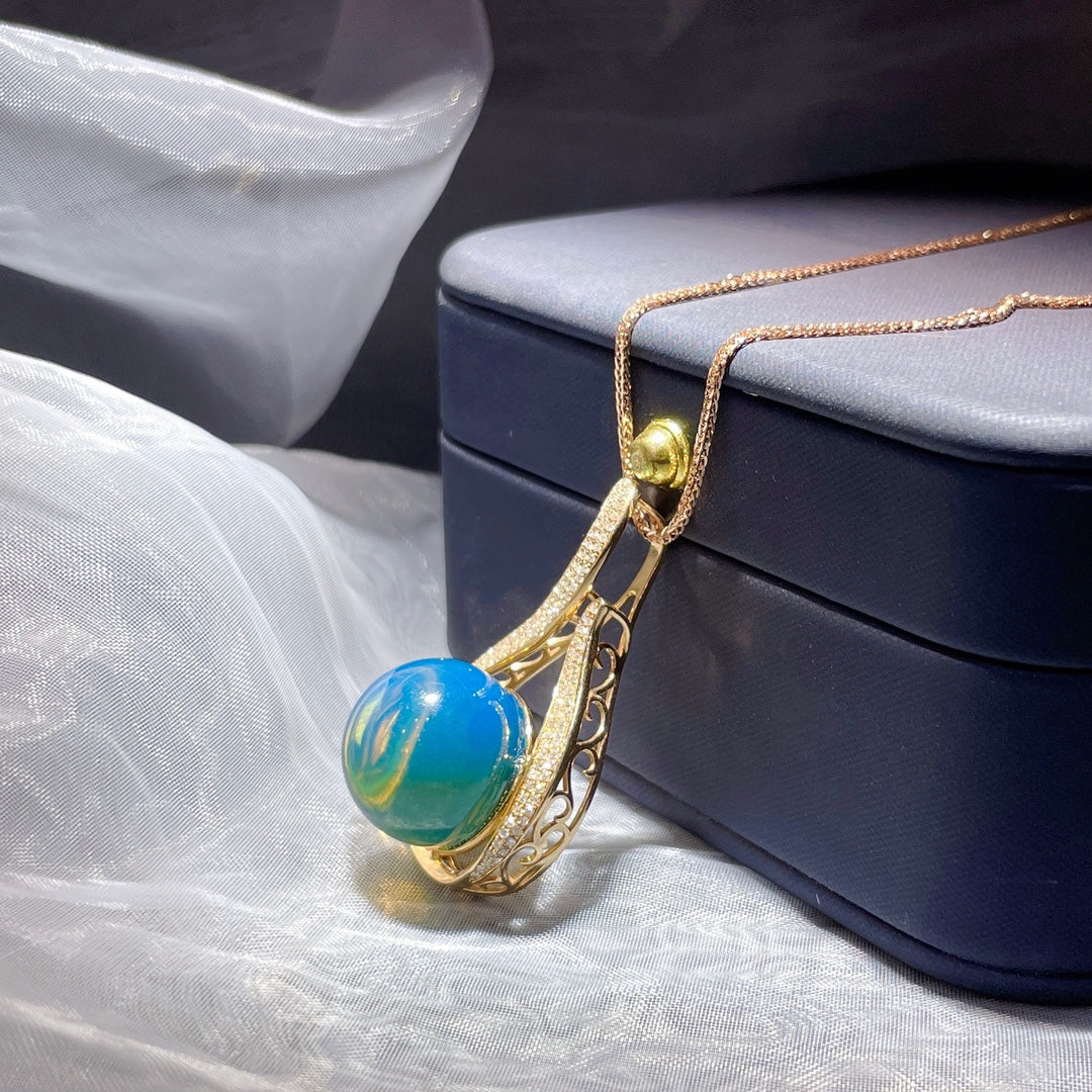 उत्तम 18K गोल्ड एंबेडेड डोमिनिकन ब्लू एम्बर पेंडेंट - मिलने के लिए गर्मी, पुनर्मिलन के लिए शरद ऋतु के आभूषण