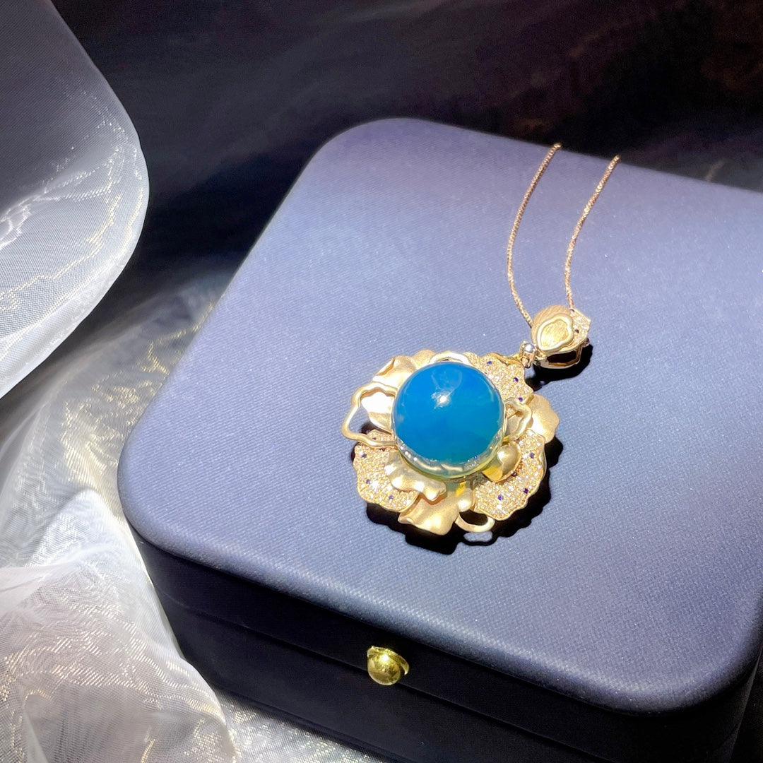 Colgante de Ámbar Azul Dominicana Incrustado en Oro de 18k - Joyería Exquisita