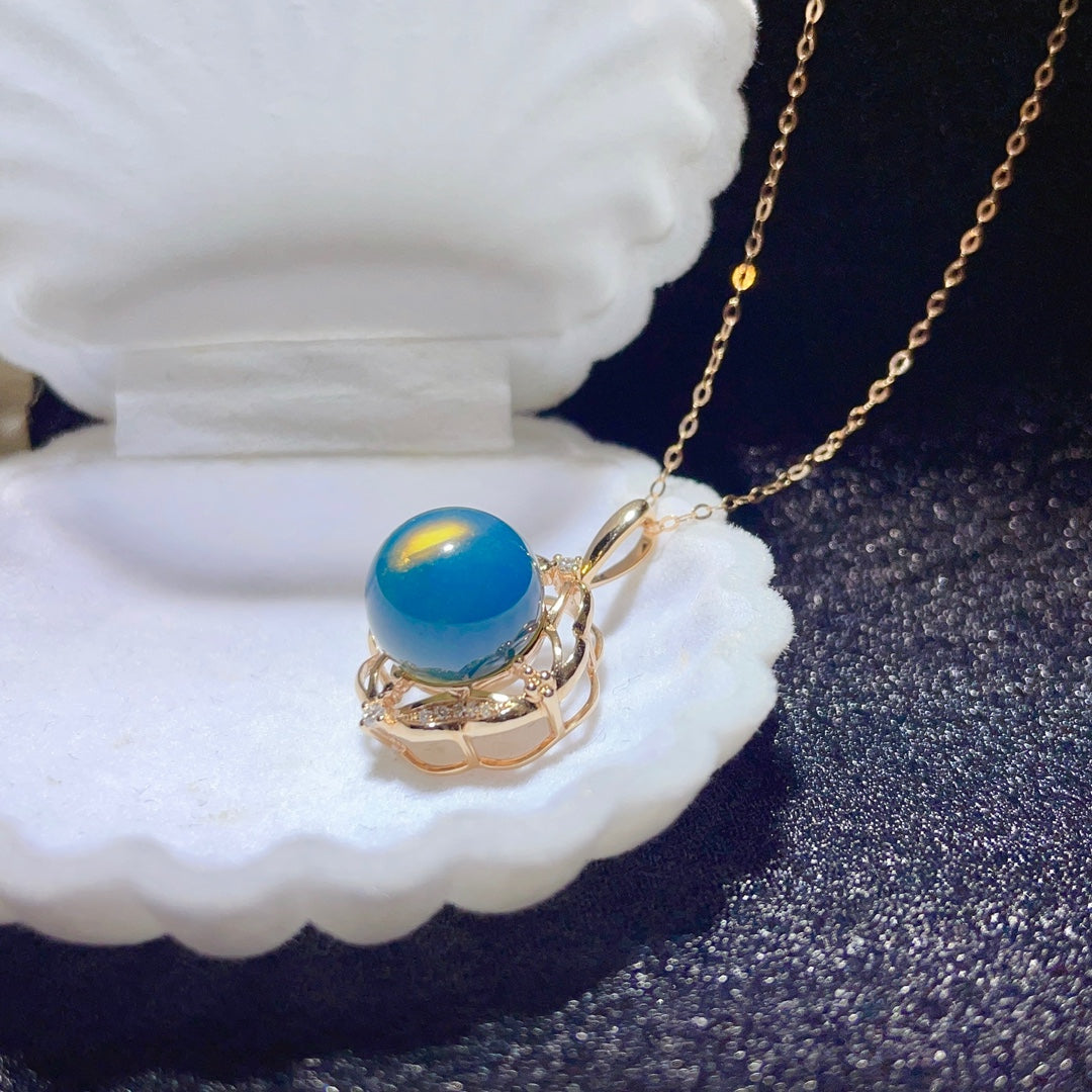 Exquisito Colgante De Ámbar Azul Dominicana Incrustado En Oro De 18 Quilates - Joyería