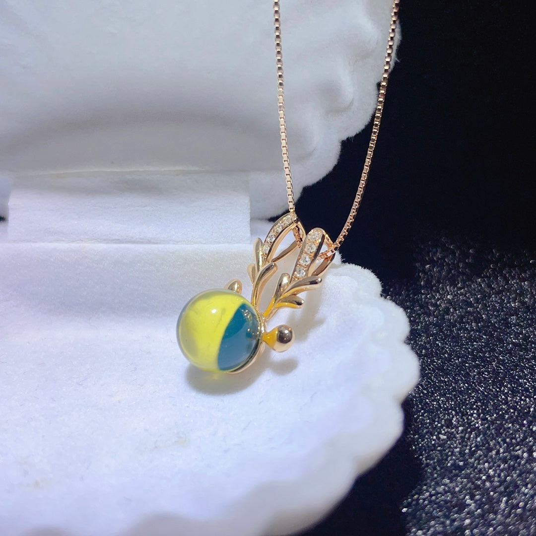 Pendentif en ambre bleu dominicain intégré en or 18 carats - Bijoux exquis