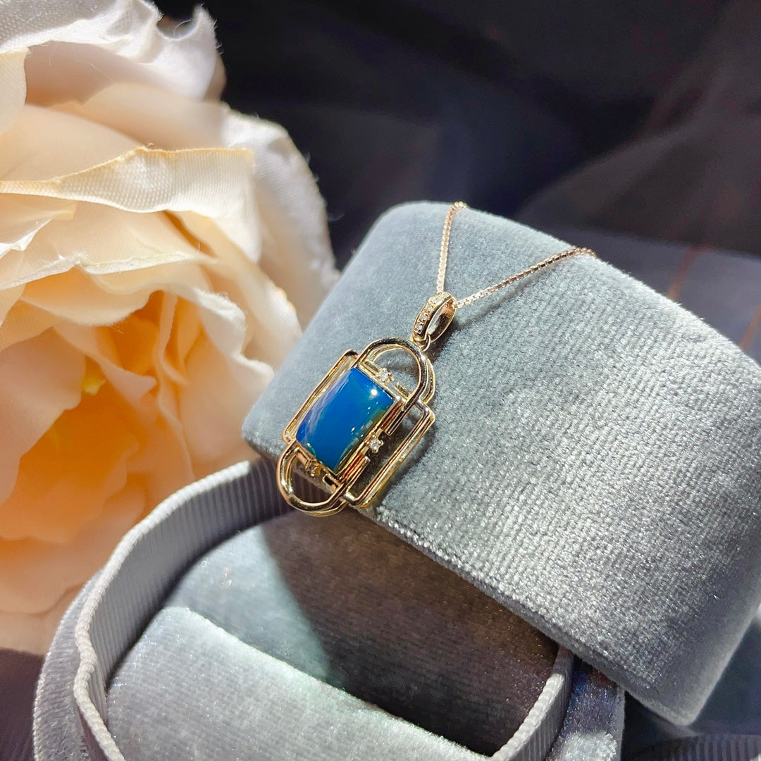 उत्तम 18K गोल्ड एंबेडेड डोमिनिकन ब्लू एम्बर पेंडेंट - रोजमर्रा की सुंदरता के लिए आभूषण