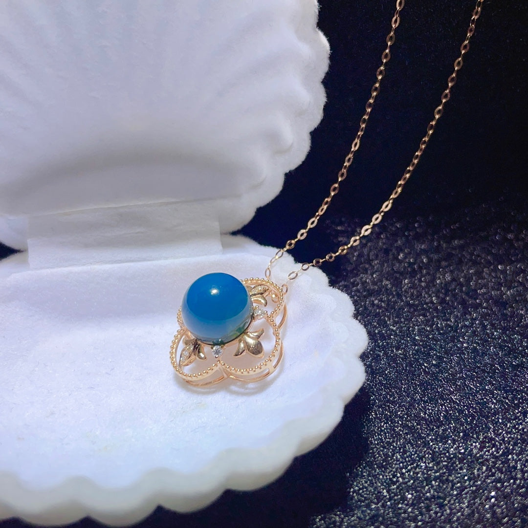 सुंदर 18k गोल्ड एंबेडेड डोमिनिकन ब्लू एम्बर पेंडेंट - शरद ऋतु के अंत और सर्दियों के स्वागत के लिए एक गहना