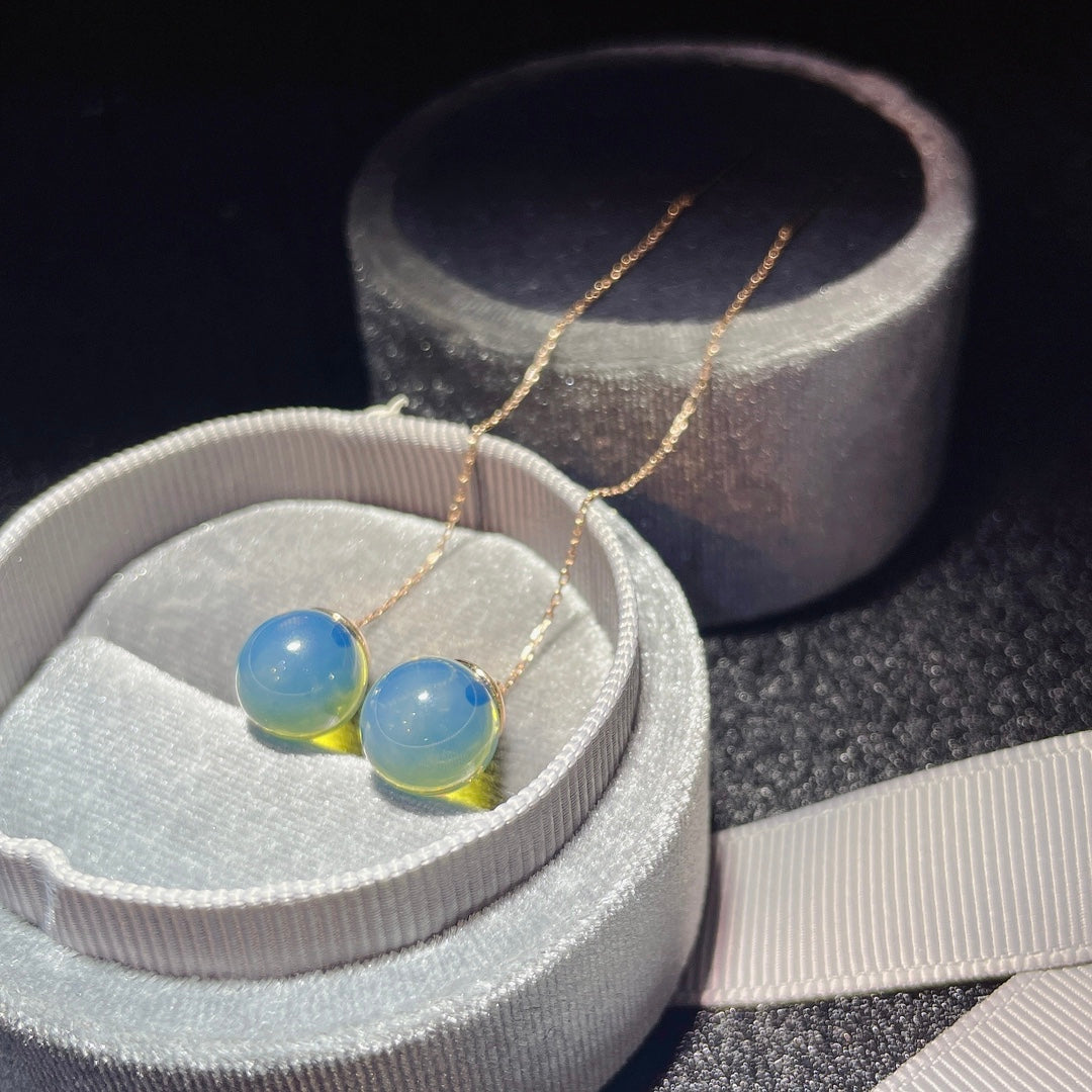Exquisite 18K Gold Embedded Dominican Blue Amber Earrings - A Surprise of Jewelry Artistry